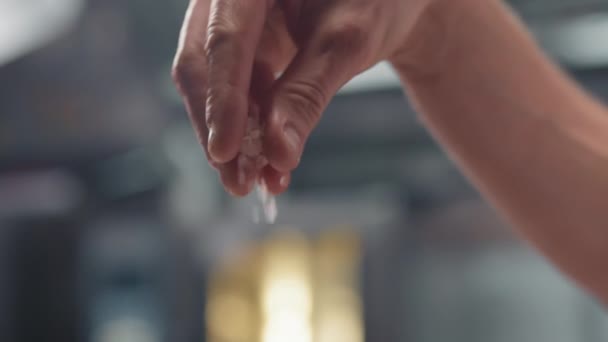 Slow Motion Close Unerizable Chef Hand Sprinking Coarse Salt Restaurant — Stock video