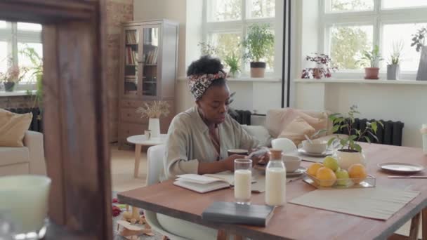 Slowmo Young Black Woman Sitting Dinner Table Cozy Loft Apartment — Stock Video