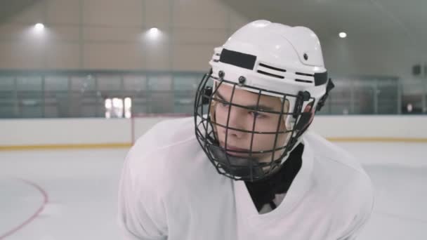 Panning Medium Close Portrait Slowmo Young Caucasian Male Hockey Player — Stock Video