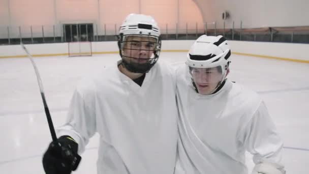 Panning Medium Closeup Portrait Slowmo Young Caucasian Male Hockey Players — Stock Video