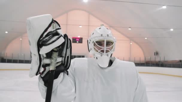 Medium Close Arc Shot Portrait Slowmo Young Male Hockey Goaltender — Stock Video