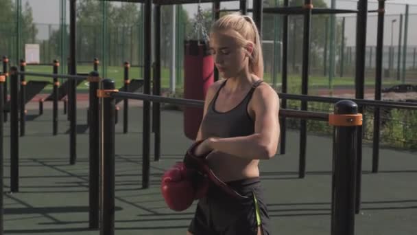 Medium Shot Young Attractive Sportswoman Fit Body Putting Boxing Gloves — Stock Video