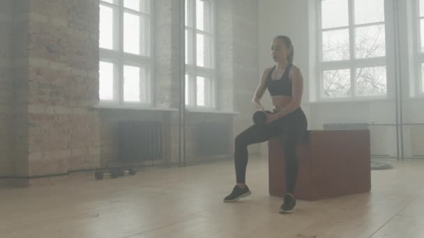 Slow Motion Full Shot Young Sportswoman Black Sportswear Sitting Sports — Vídeo de Stock