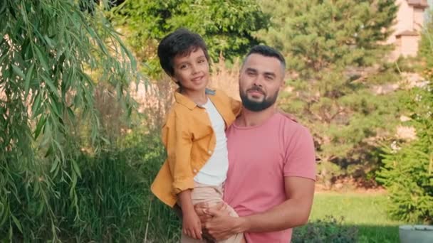 Medium Portrait Handsome Mixed Race Man Holding Year Old Son — Stock Video