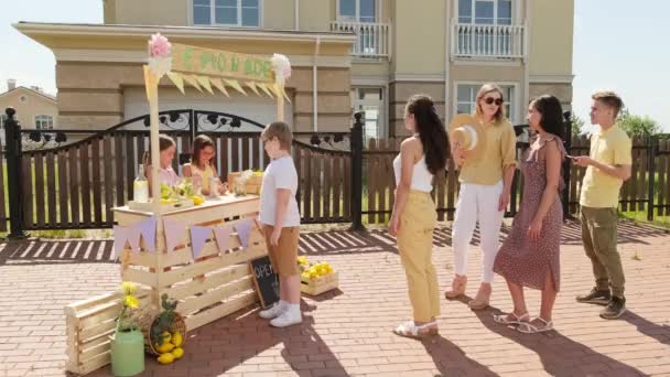 Full Shot People Standing Queue Buy Homemade Lemonade Childs Stand — Stock Video