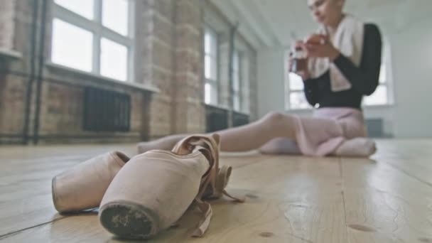 Closeup Pointe Shoes Wooden Floor Ballet Studio Young Caucasian Ballerina — Stock Video