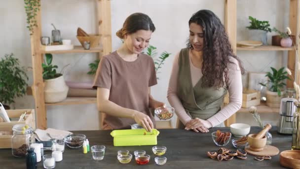 Medium Pan Shot Two Smiling Women Decorating Customizing Handmade Natural — Stock Video