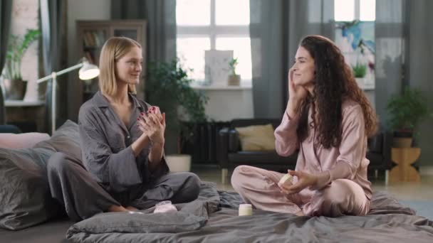 Medium Shot Two Young Pretty Women Silk Pajamas Sets Sitting — Stock Video