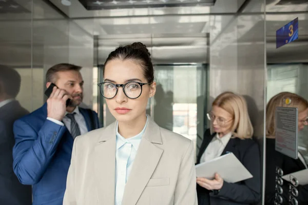 Portrait Serious Attractive Business Lady Standing Elevator Busy People Background — Stock Photo, Image