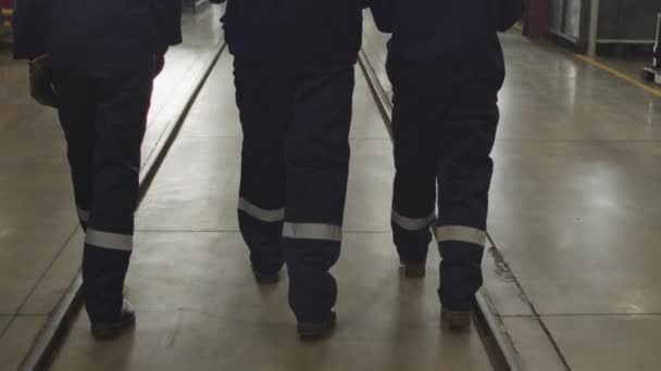 Tilt Rear View Shot Slowmo Three Male Female Workers Coverall — Stok video