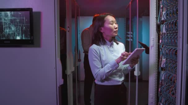 Slowmo Shot Asian Woman Looking Computing Equipment Server Room Data — Video