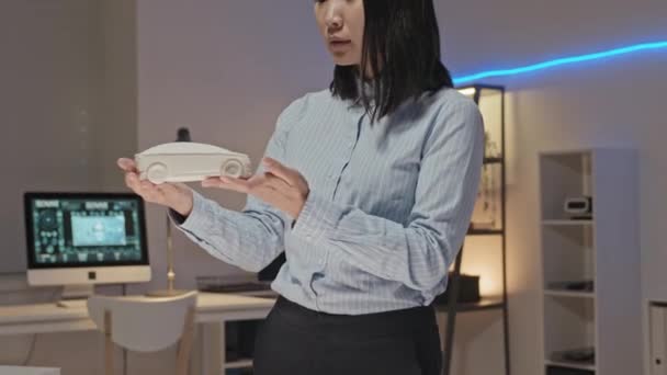 Tracking Slowmo Young Female Asian Engineer Standing Office Inspecting Printed — Stock Video