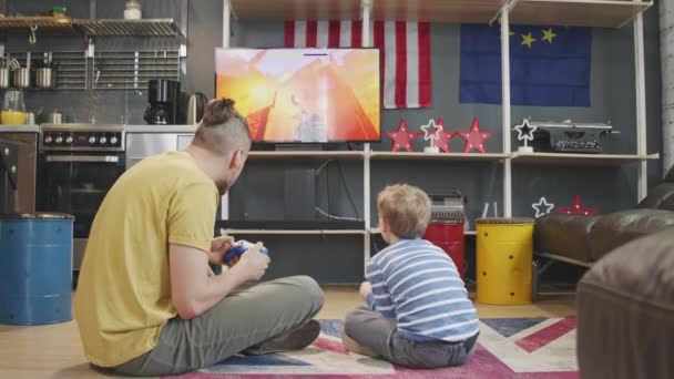 아파트의 양탄자 비디오 게임을 아버지와 아들의 — 비디오