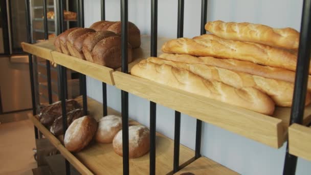 Tracking Slowmo Shot Fresh Loaves Bread Lying Shelves Bakery — Stock Video