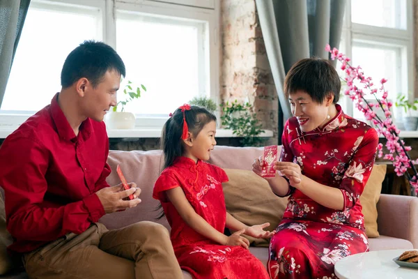 Happy Asian family of three — Stock Photo, Image