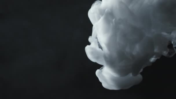 Slowmo Clouds White Smoke Falling Swirling Black Background — Stock Video