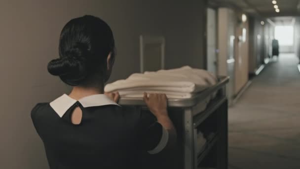 Rear View Slowmo Shot Female Housekeeper Carrying Hand Cart Fresh — Vídeos de Stock