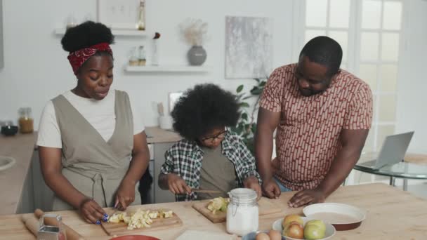 Medium Slowmo Shot Cheerful African American Family Three Cooking Together — Stock Video