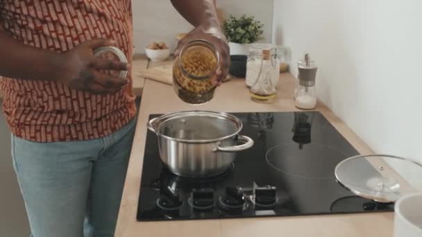 Midsection Slowmo Shot Unrecognizable African American Man Casualwear Cooking Pasta — Stock Video