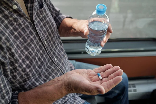 Taking Pill In Bus — Stock Photo, Image