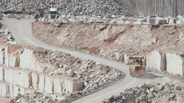 Tracking Shot Loader Moving Block Granite Driving Haul Road Lomry — Stock video