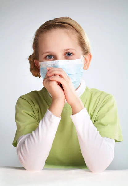 Sad girl in face mask — Stock Photo, Image