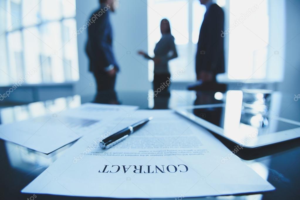 Contract on office table