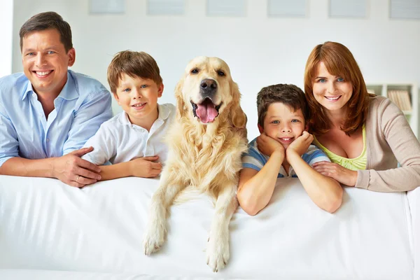 Happy family with dog — Stock Photo, Image