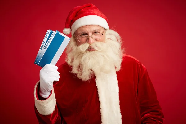 Santa con billetes de avión — Foto de Stock