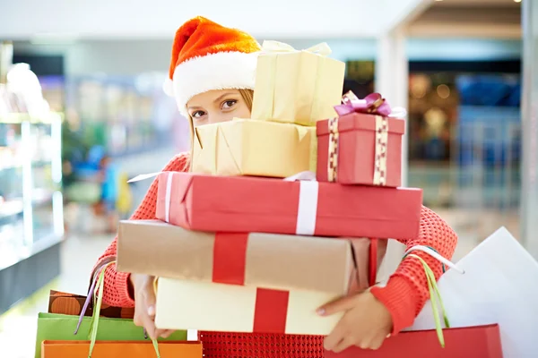 Young woman with Christmas presents — Stock Photo, Image