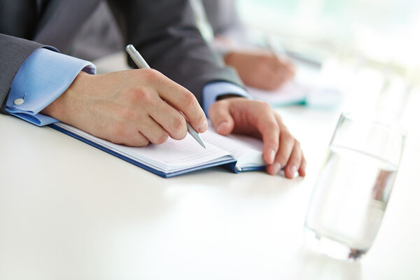 Hand of businessman with ballpoint