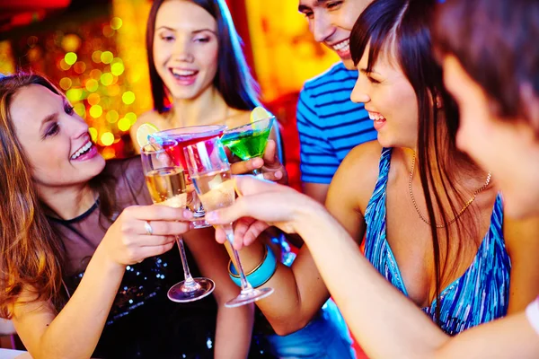 Friends toasting with flutes of champagne — Stock Photo, Image