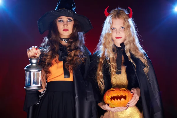 Girls with lantern and pumpkin — Stock Photo, Image