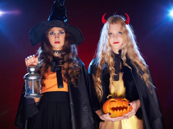 Girls with lantern and pumpkin — Stock Photo, Image
