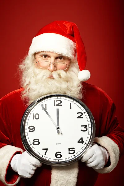 Santa claus bedrijf klok — Stockfoto