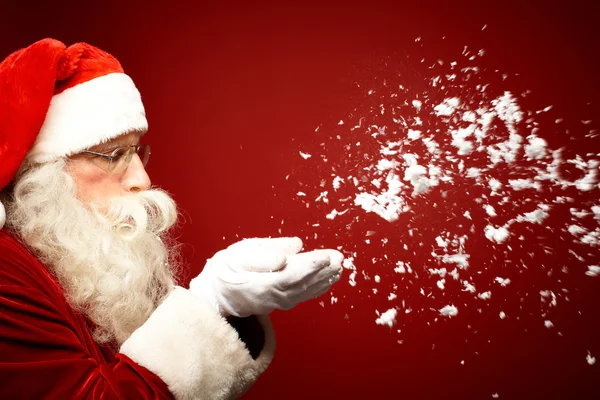 Babbo Natale che soffia neve — Foto Stock