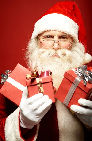 Santa Claus with gift boxe Stock Photo