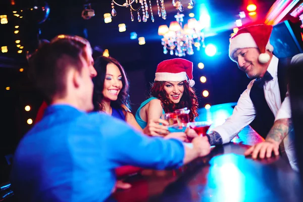 People toasting in bar — Stock Photo, Image