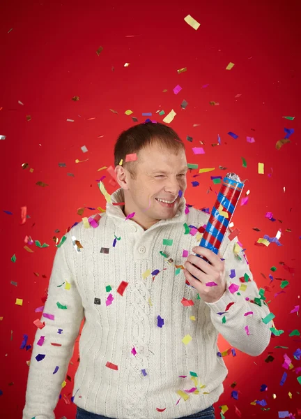 Man with confetti cracker — Stock Photo, Image