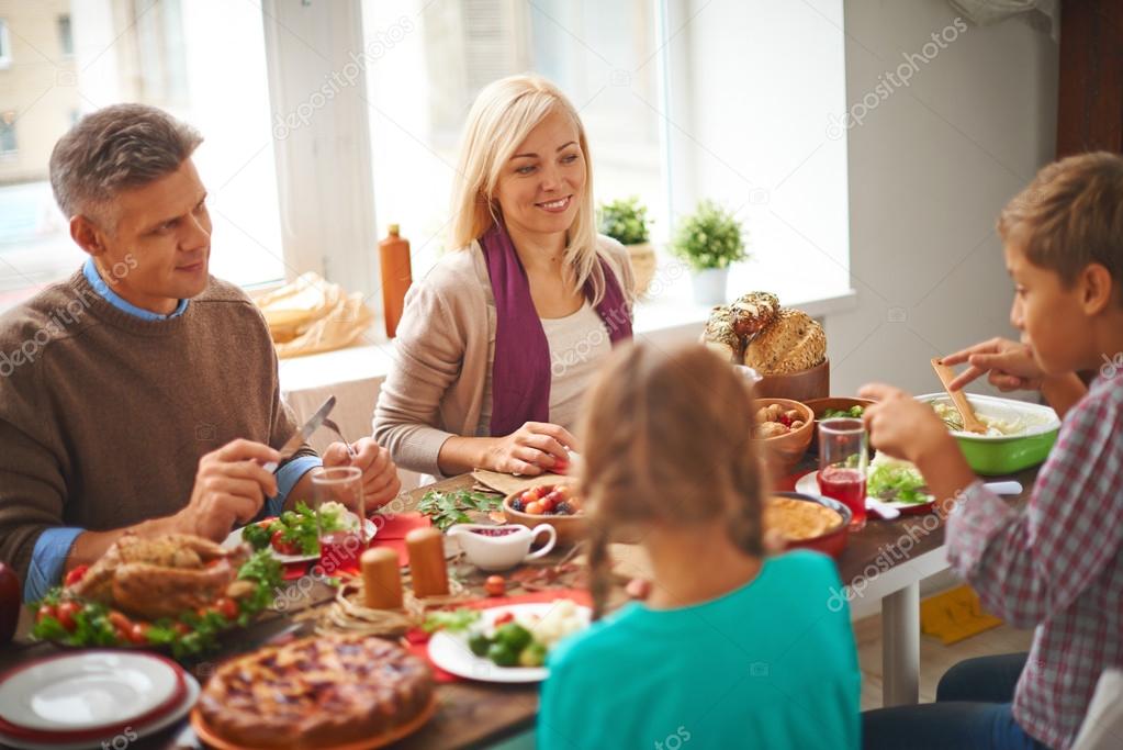 Family eating Thanksgiving food