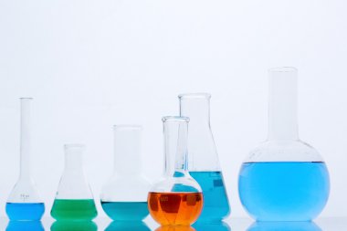 Flasks with multi-color liquids clipart