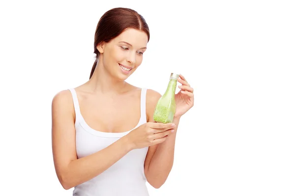 Woman showing bath salt — Stock Photo, Image