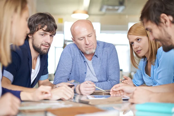 Confident business people  at meeting