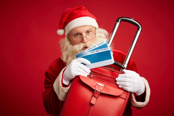Santa Claus con billetes de avión — Foto de Stock
