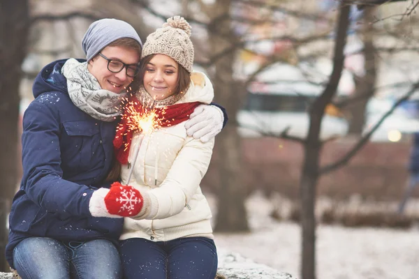 Young couple  with Bengal light — Stock Photo, Image