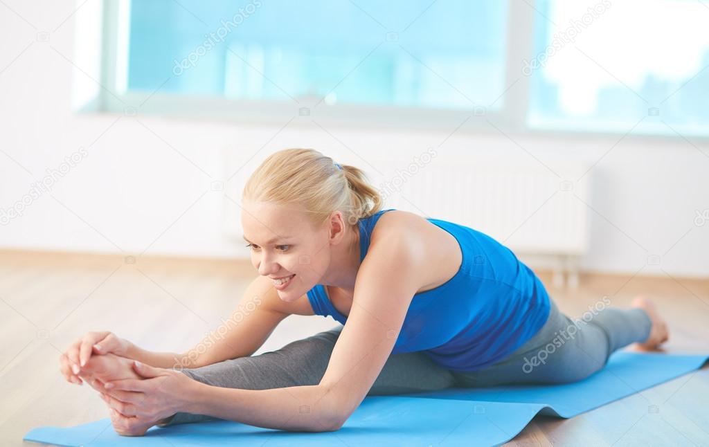 Woman doing stretching exercise