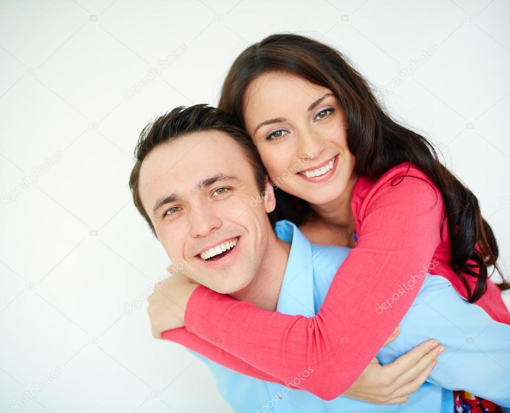 Woman embracing husband