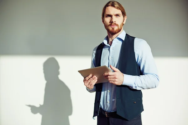 Businessman with touchpad — Stock Photo, Image