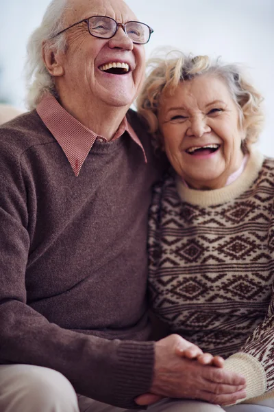 Senior man and woman laughing — Stock Photo, Image