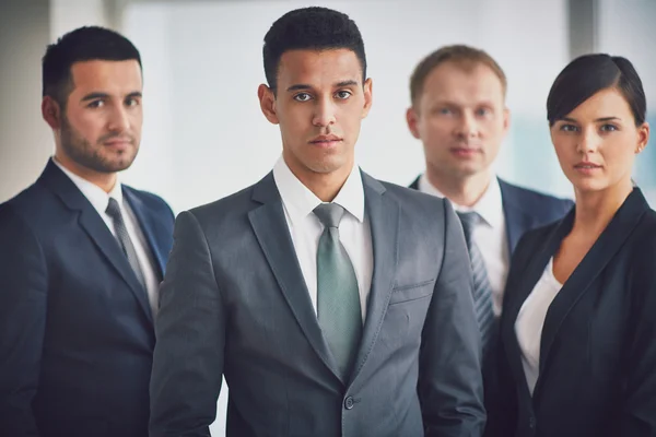 Business leader and team — Stock Photo, Image